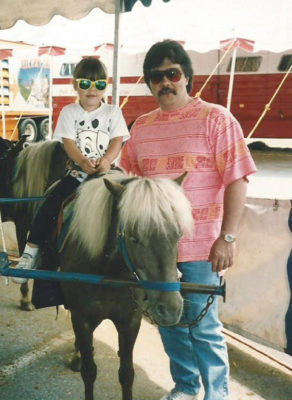 Caitlin with father on horse