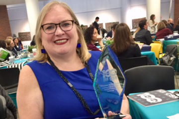 Suzanne McGillicuddy with her Responsible 100 award