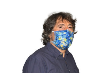 Man wearing mask with print of starry sky
