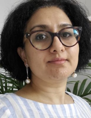 Headshot of woman with glasses