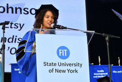 Dayna Isom Johnson, Fashion Merchandising Management ’07, Trend Expert at Etsy and judge on NBC’s “Making It,” speaking at the podium